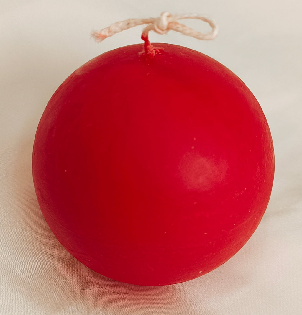 Adorno de vela esférica roja para árbol de Navidad, ideal como decoración festiva y regalo en Barcelona.